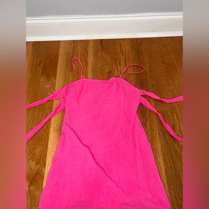 Pink short dress with ties in the back